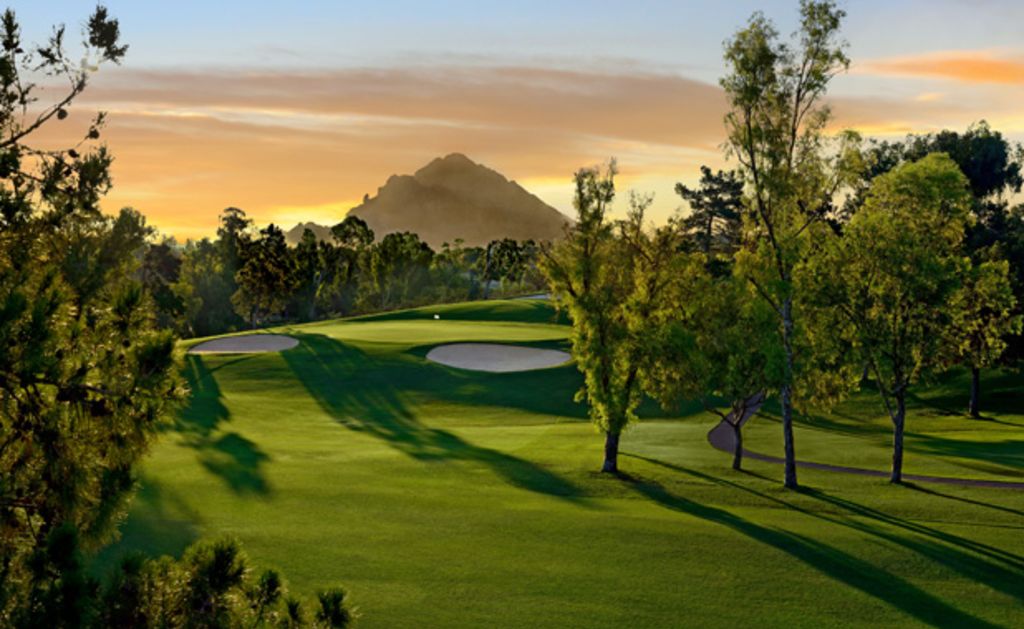 The Arizona Biltmore Golf Club fairway and greens with trees along the lining