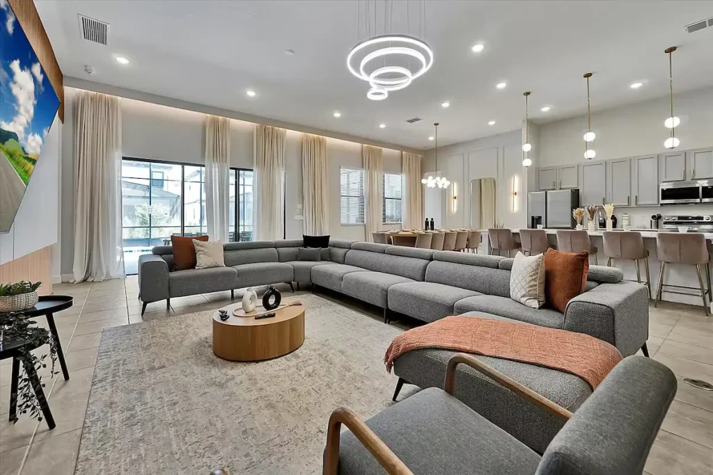 The massive main living area, dining room and kitchen of the vacation rental. This large room can fit quite a bit of people at once. 